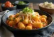 Tteokbokki con queso, pastel de arroz coreano en salsa de queso
