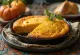 Pan de elote con calabaza, servido en rebanadas frescas doradas