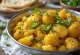 Aloo gobi con chile, servido con cilantro fresco