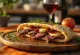 Pita Especial del Chef con carne de res, queso camembert y arúgula