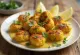Dhokar dalna al jengibre con salsa abundante