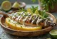 Ikan bakar con leche de coco, pescado a la parrilla con salsa de coco y cilantro