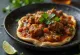 Estofado de cordero etíope con berbere servido con pan injera
