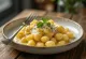 Gnocchi cremoso de queso servido