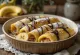 Cannelloni dulce de plátano y crema de avellanas servido