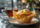 Muffins de naranja y vainilla espolvoreados con azúcar glass