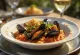 Sururu en salsa de jitomate, platillo rico en mariscos